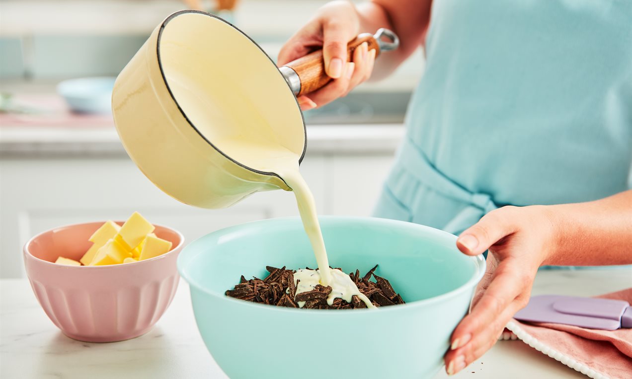 Picture - Pouring Cream into Bowl of ganache