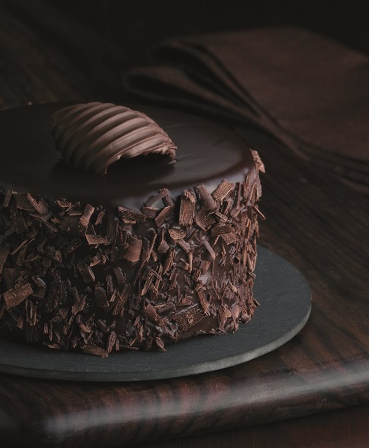 Cheesecake-Stuffed Dark Chocolate Cake Recipe | MyRecipes