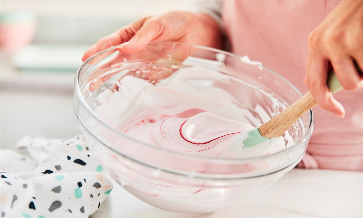Picture - Stirring colour gel into meringue